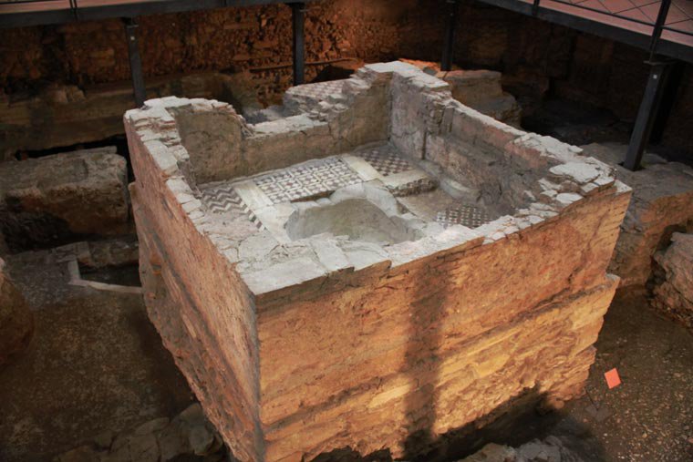Remains baptismal font